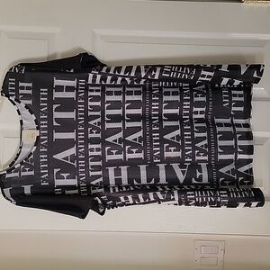 Black top with rhinestones letters.